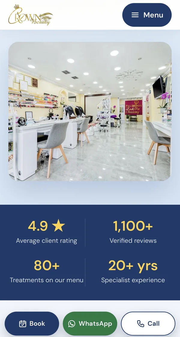 Crown Beauty website on a phone, showing the salon, its 4.9 star rating and Book, WhatsApp and Call buttons